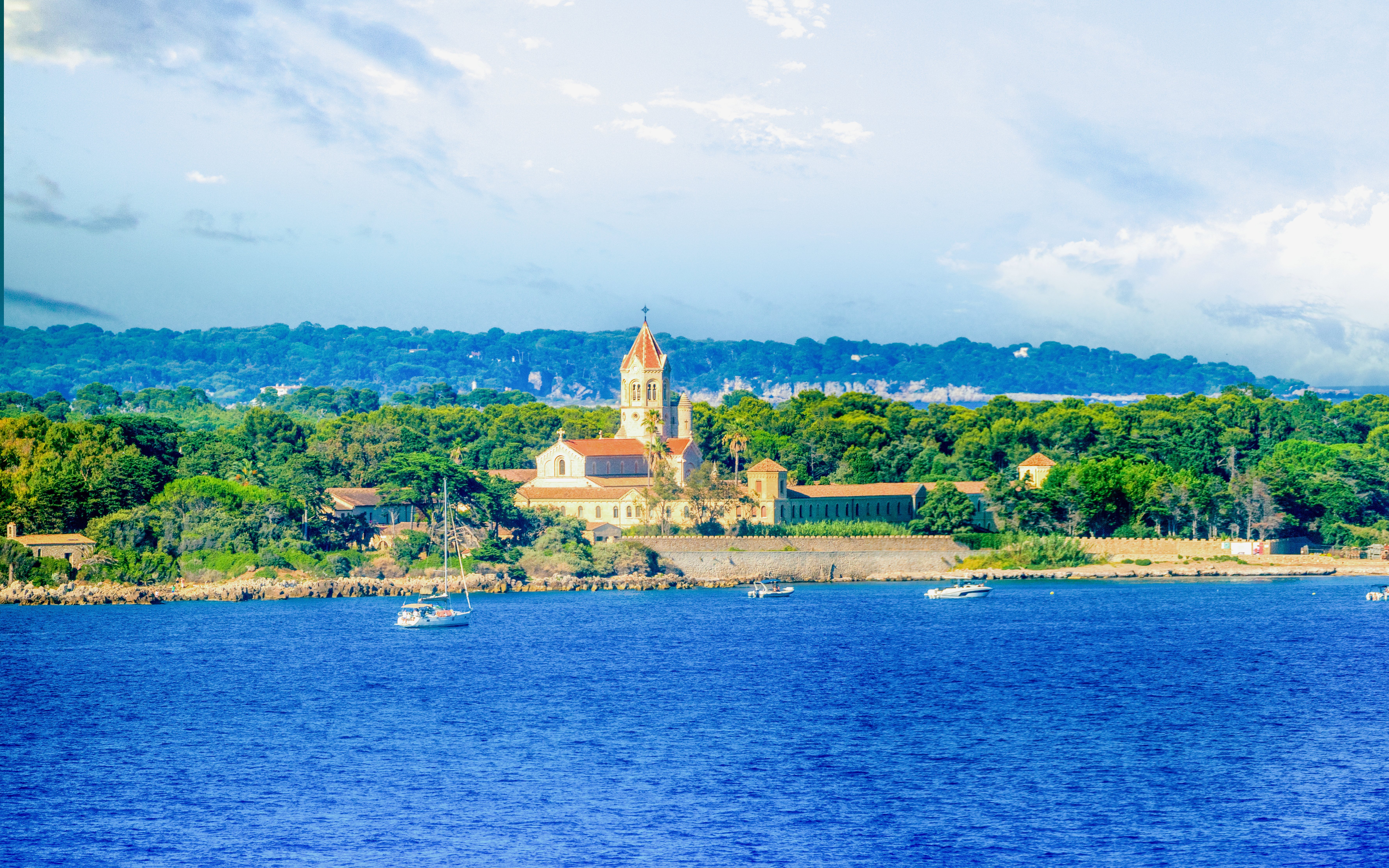 Lérins Islands view from a private boat tour departing Cannes, featuring a historic abbey.