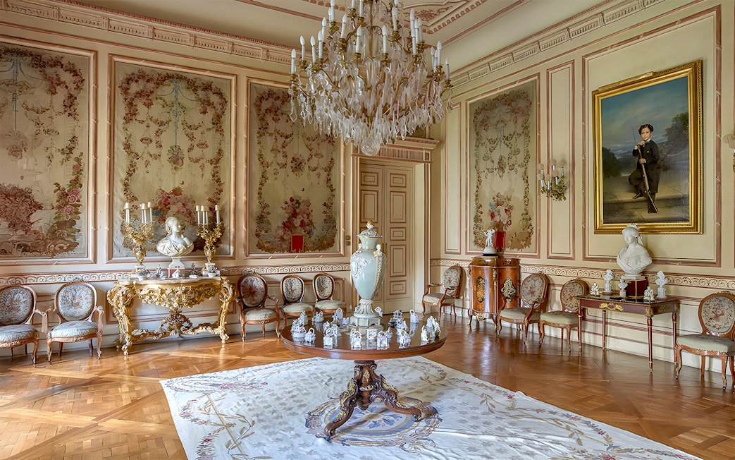 Liria Palace room with ornate ceiling, classic furnishings, and chandelier, Madrid.