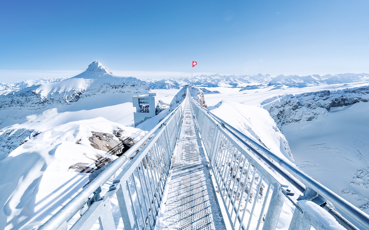 Glacier 3000 suspension bridge with snowy Alps in Montreux, Switzerland.