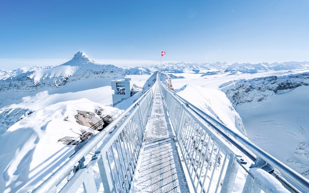 Glacier 3000 suspension bridge with snowy Alps in Montreux, Switzerland.