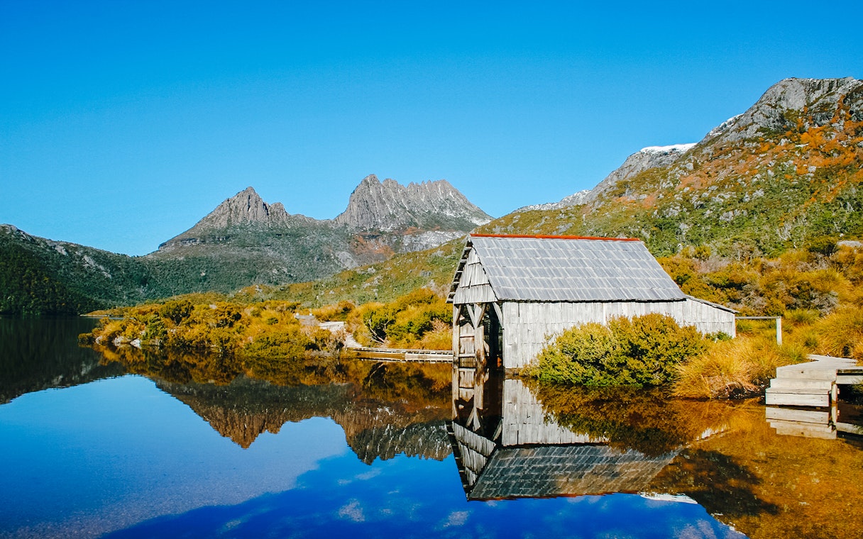 Cradle Mountain and Dove Lake with boathouse, Tasmania, on a guided walking tour.