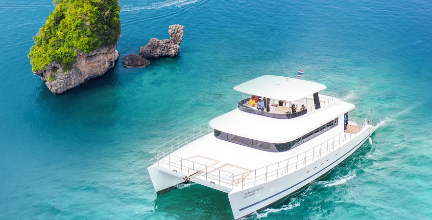 Premium yacht cruising near limestone island in Phuket on James Bond Sunset Tour.