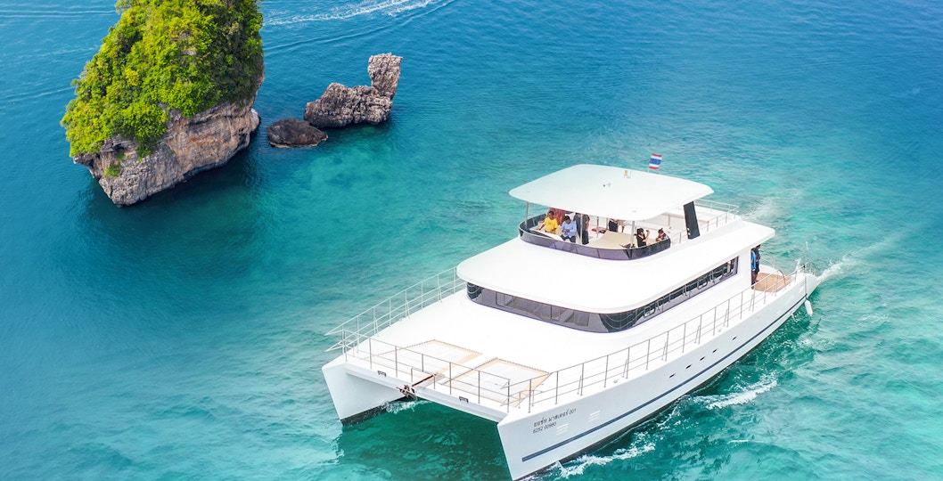 Premium yacht cruising near limestone island in Phuket on James Bond Sunset Tour.