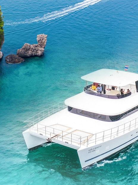 Premium yacht cruising near limestone island in Phuket on James Bond Sunset Tour.