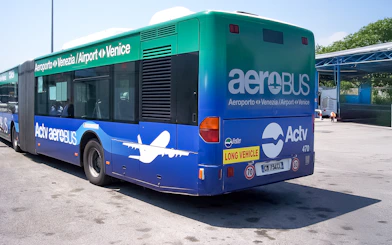 Venice Marco Polo Airport transfer bus parked at terminal.