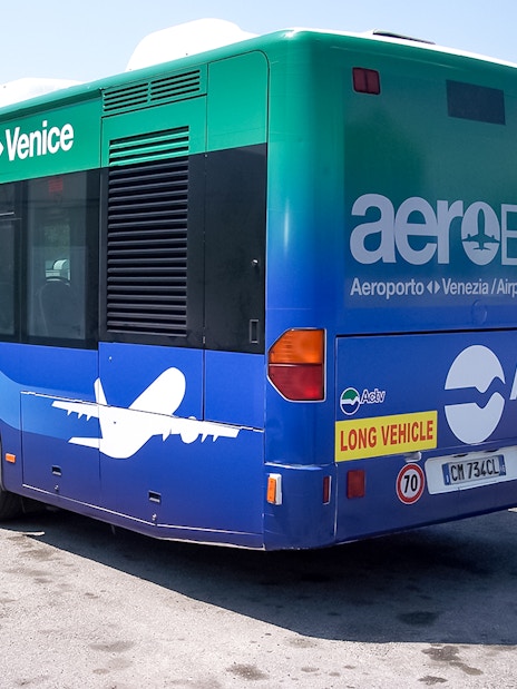 Venice Marco Polo Airport transfer bus parked at terminal.