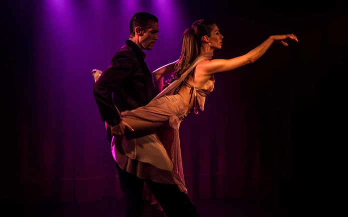 Dancers performing at Rojo Tango Show in Buenos Aires.