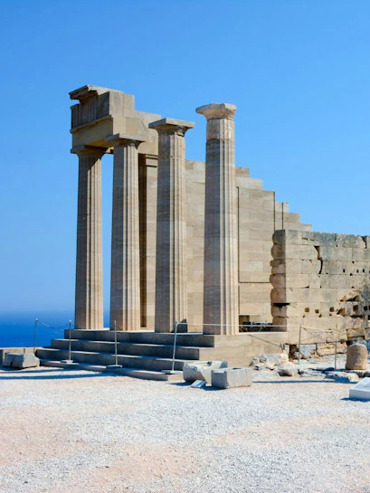 Acropolis of Lindos ruins with ancient columns in Greece.
