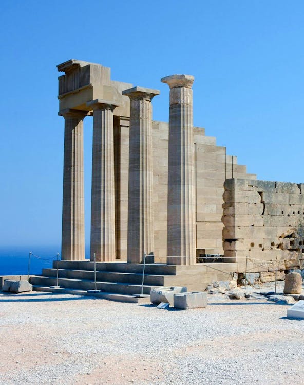 Acropolis of Lindos ruins with ancient columns in Greece.