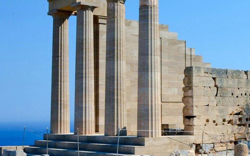 Acropolis of Lindos ruins with ancient columns in Greece.