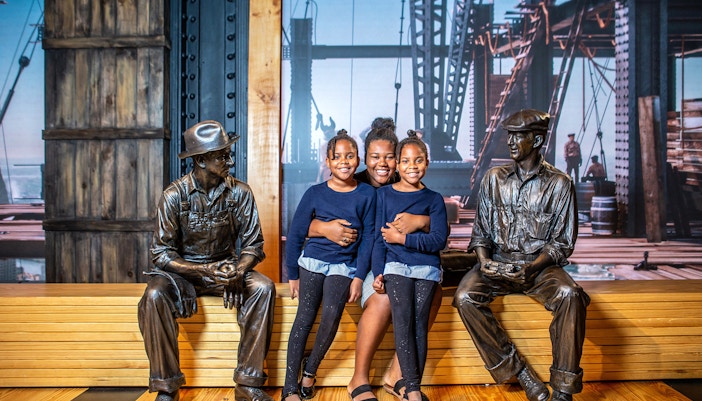 tourists enjoying inside indoor viewing gallery