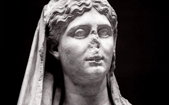 Marble female funerary statue from 320 BC, National Archaeological Museum, Athens.