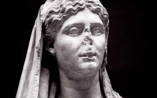 Marble female funerary statue from 320 BC, National Archaeological Museum, Athens.