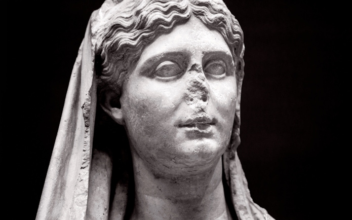 Marble female funerary statue from 320 BC, National Archaeological Museum, Athens.