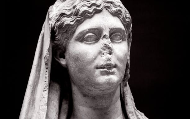 Marble female funerary statue from 320 BC, National Archaeological Museum, Athens.