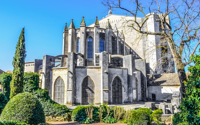 Exterior view of Girona Cathedral in Catalonia, Spain, showcasing Gothic architecture.
