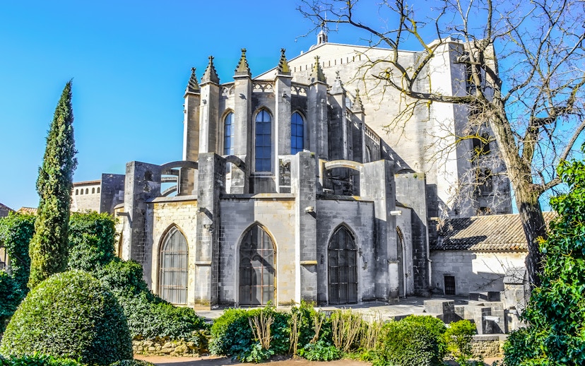 Exterior view of Girona Cathedral in Catalonia, Spain, showcasing Gothic architecture.