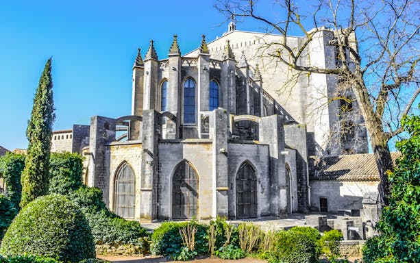 Exterior view of Girona Cathedral in Catalonia, Spain, showcasing Gothic architecture.