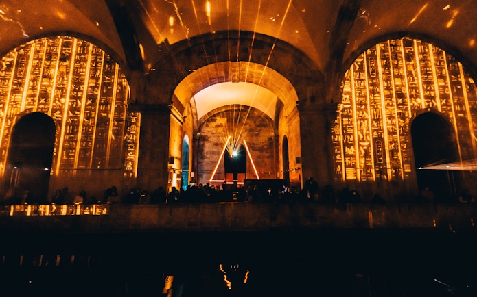 Visitors at Immersivus Gallery Lisbon enjoying an audiovisual show on Ancient Egypt.