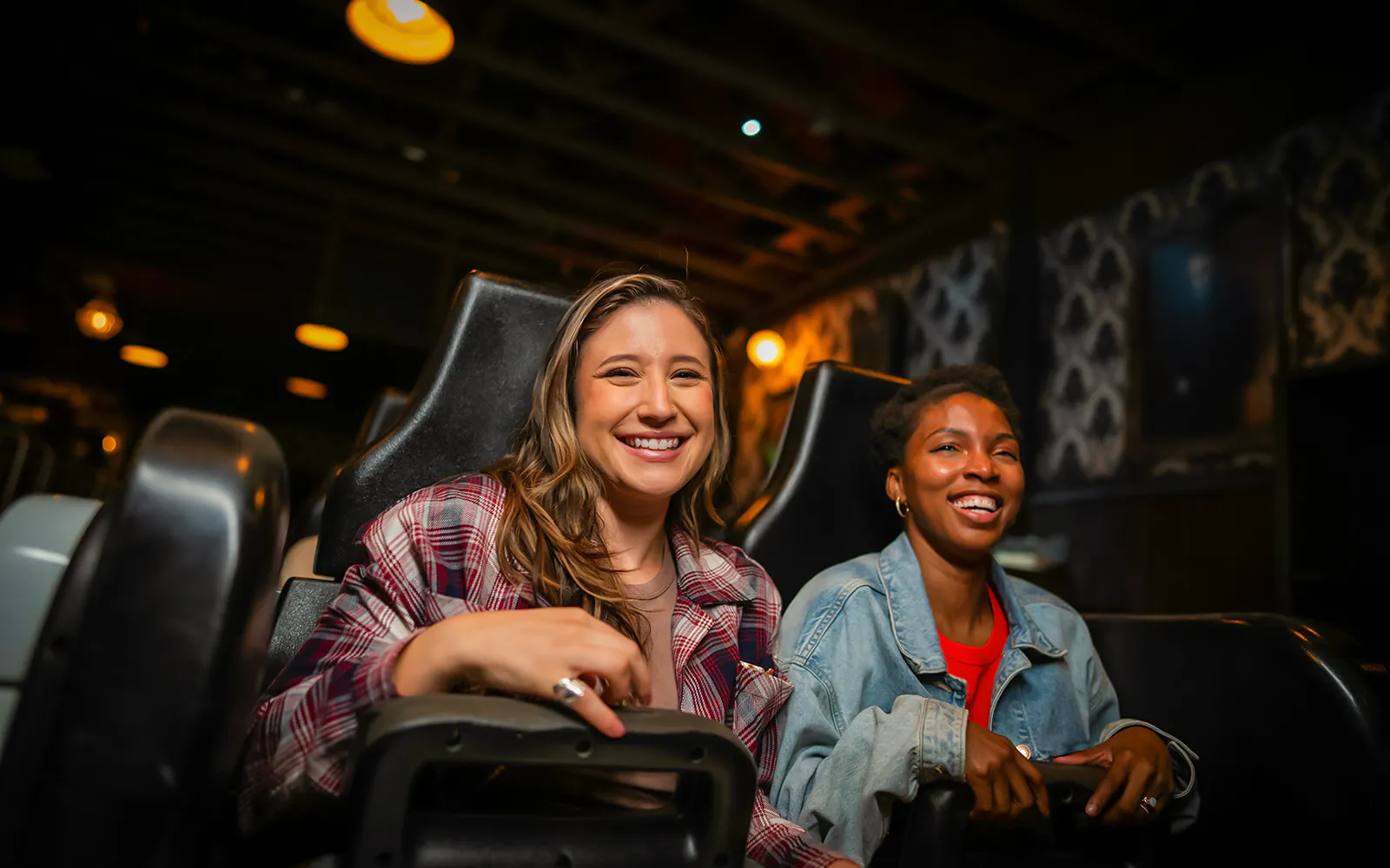 Guests enjoying a ride in Halloween Haunt zones at Dorney Park.