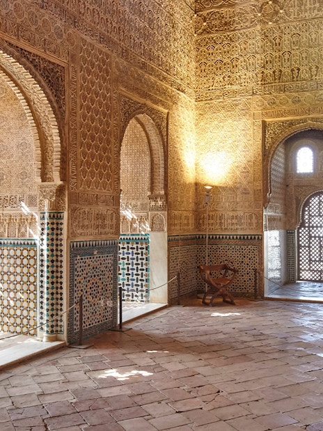 Ambassadors Hall in Alhambra, intricate ceiling and wall design, Granada, Spain.