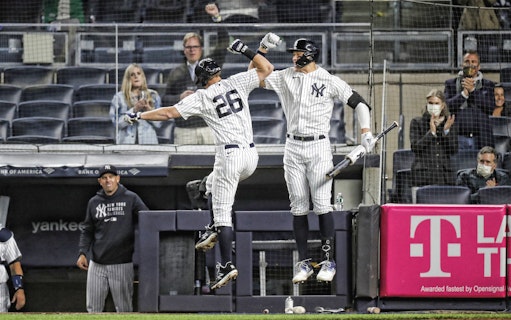 New York Yankees players celebrating during game against Detroit Tigers, September 7, 2023.
