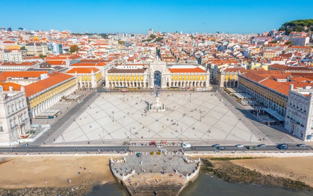 Aerial view of Rua Augusta Arch and Praça do Comércio in Lisbon, Portugal.