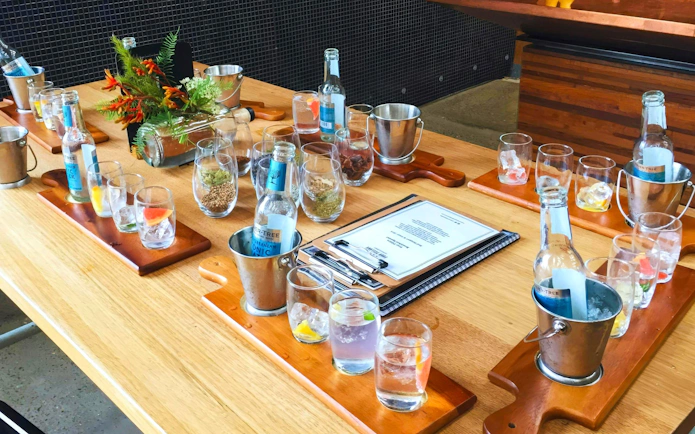 Tasting setup with tonic bottles and garnishes at Yarra Valley Winery Tour.