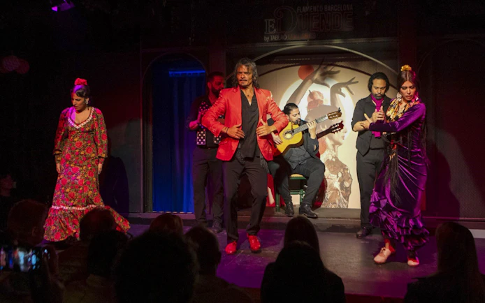 Flamenco dancers and musicians performing at El Duende by Tablao Cordobes in Barcelona.