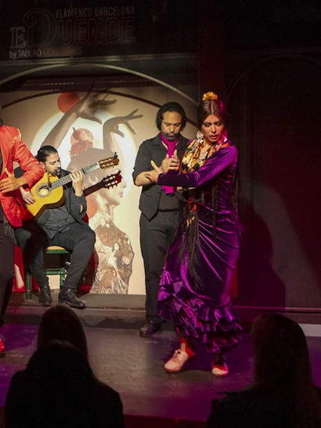 Flamenco dancers and musicians performing at El Duende by Tablao Cordobes in Barcelona.