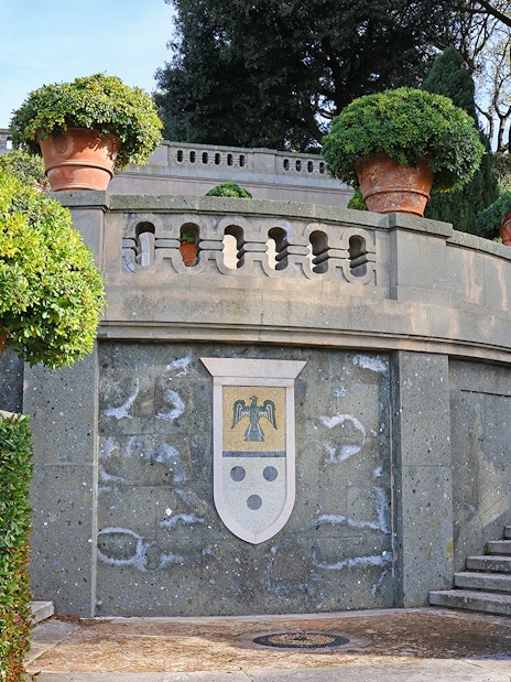 Terracotta pots and greenery in Castel Gandolfo Garden, Italy.
