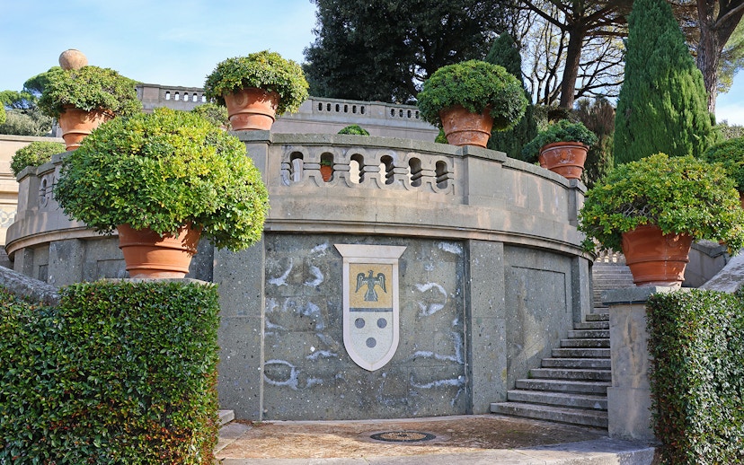 Terracotta pots and greenery in Castel Gandolfo Garden, Italy.