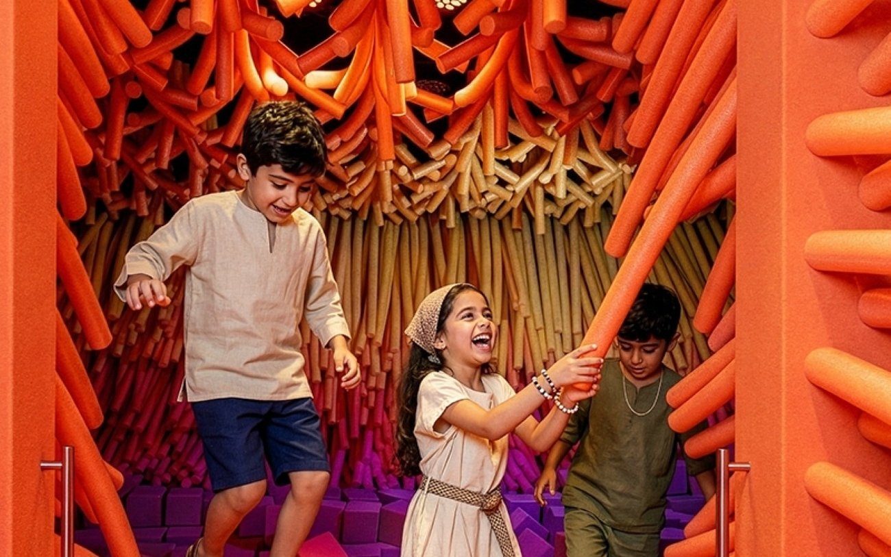 Kids enjoying interactive play area at Dopamine Land, Dubai.