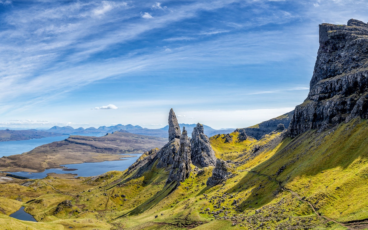 Old Man of Storr rock formation on Isle of Skye, Scotland, with surrounding landscape.
