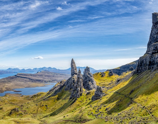 Old Man of Storr rock formation on Isle of Skye, Scotland, with surrounding landscape.