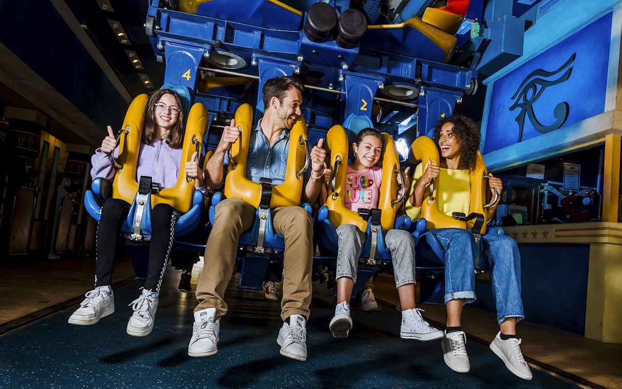 Visitors enjoying a ride at Parc Asterix, France.