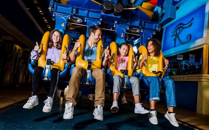 Visitors enjoying a ride at Parc Asterix, France.