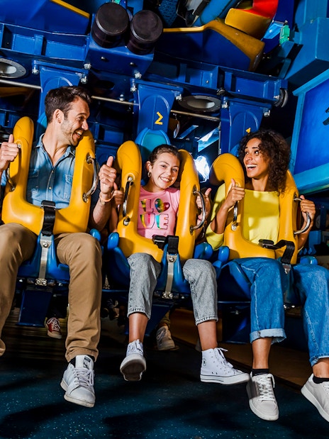 Visitors enjoying a ride at Parc Asterix, France.