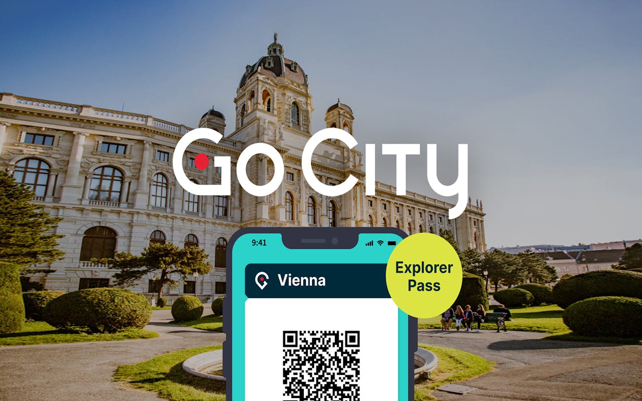Vienna Explorer Pass with QR code in front of a historic building.