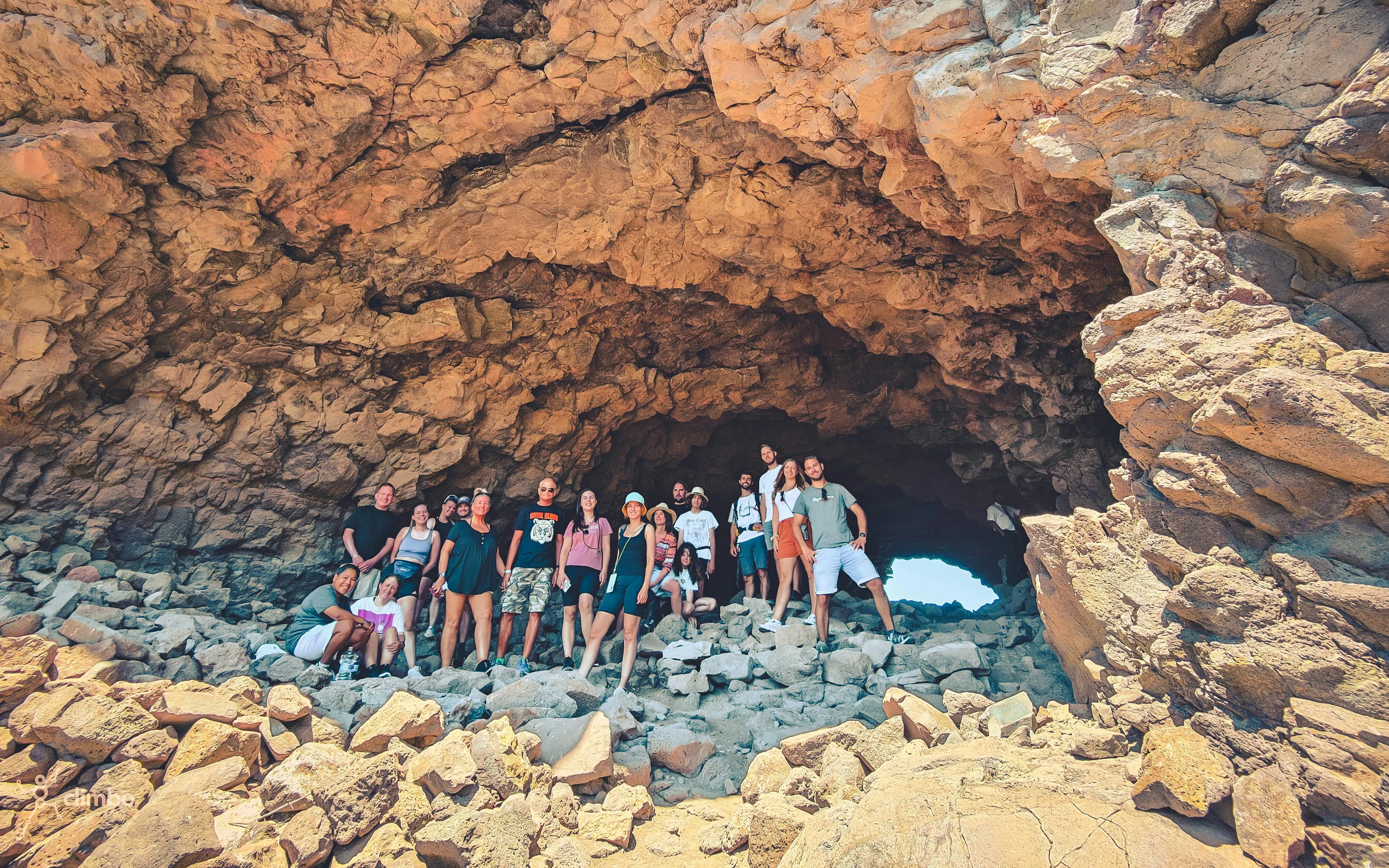 Group exploring rocky cave on Red Canyon Tour, Gran Canaria.