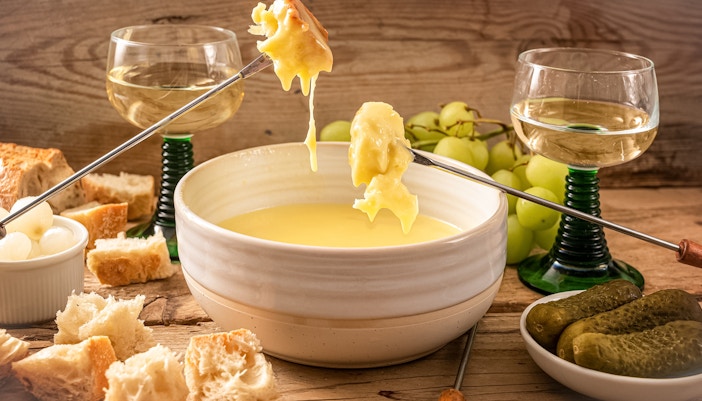 Cheese Fondue with Wine Glasses and Bread