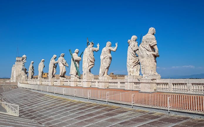 Statues atop St. Peter’s Basilica Dome during guided tour in Vatican City.