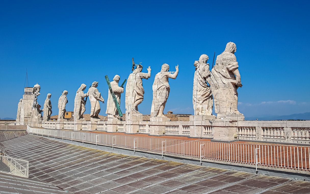 Statues atop St. Peter’s Basilica Dome during guided tour in Vatican City.