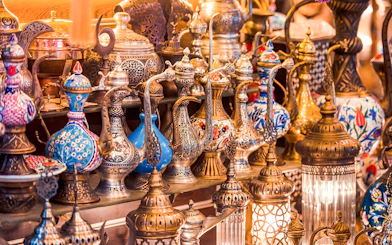 Traditional Turkish teapots and lamps displayed in Istanbul market.
