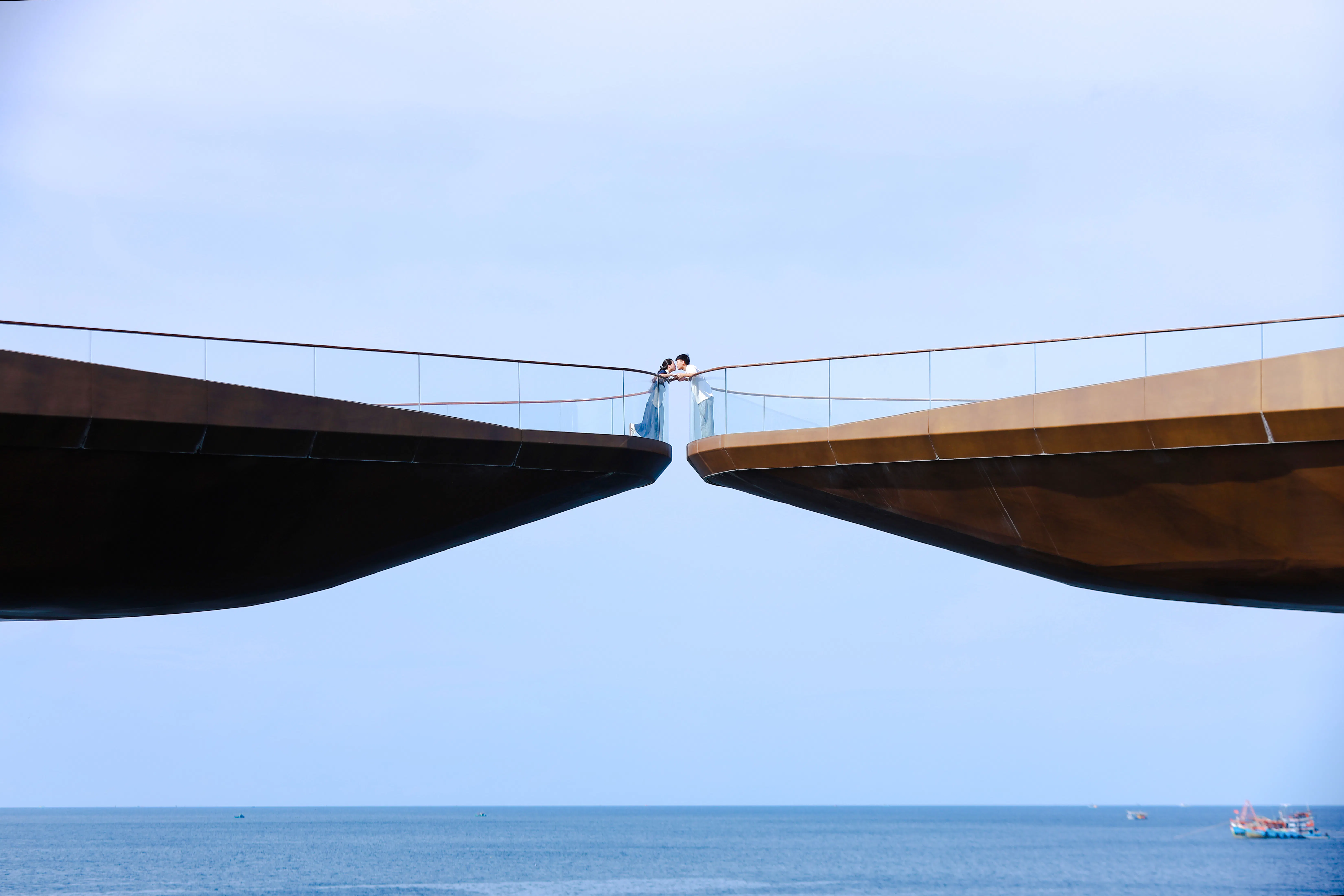 Kiss Bridge over ocean in Phu Quoc during sunset tour.