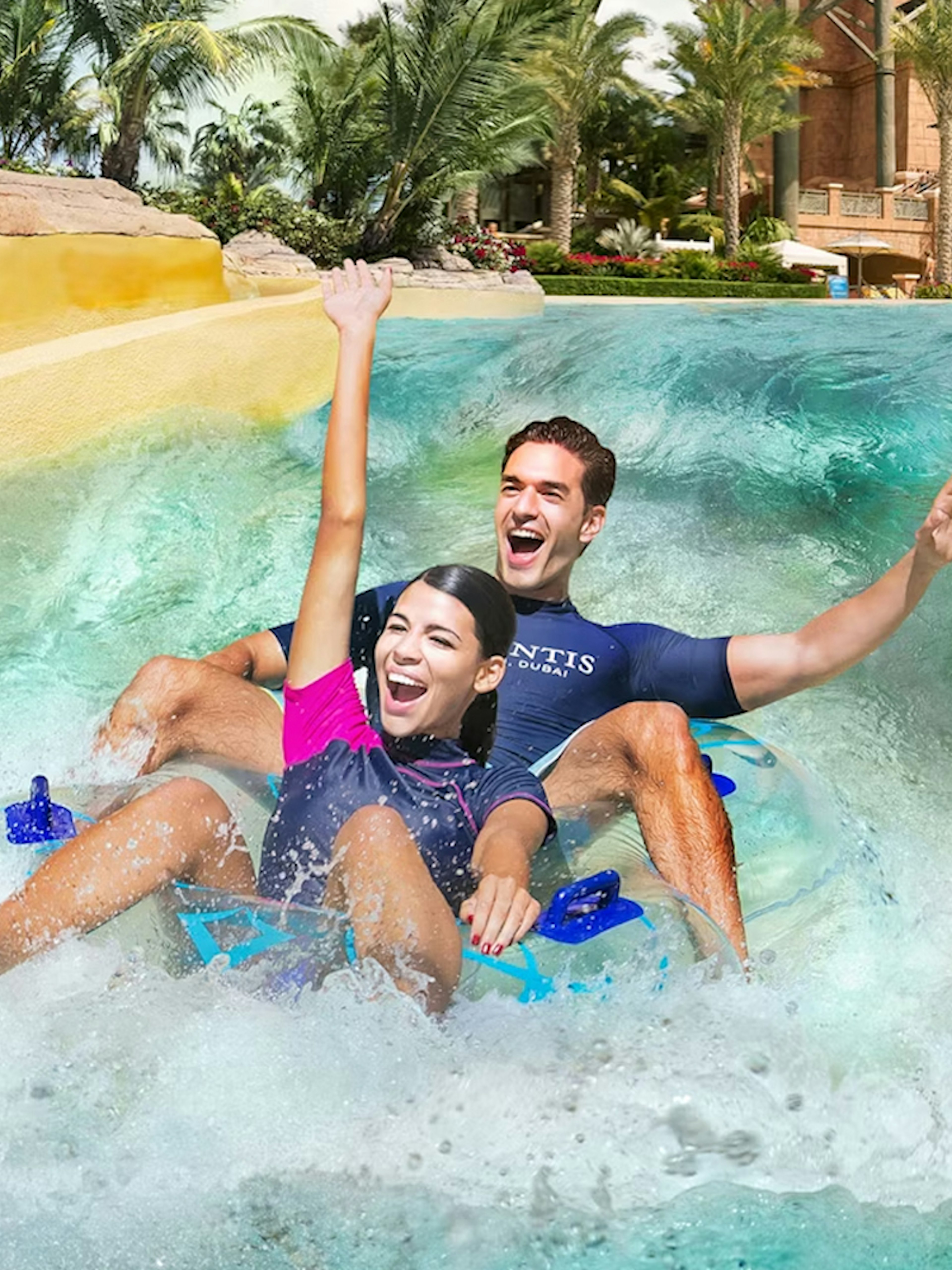 Tourists enjoying water slide at Aquaventure Waterpark, Dubai.