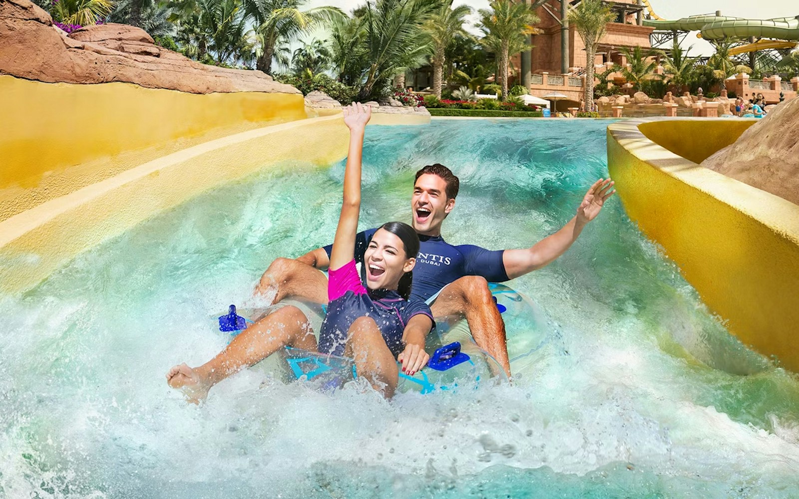 Tourists enjoying water slide at Aquaventure Waterpark, Dubai.