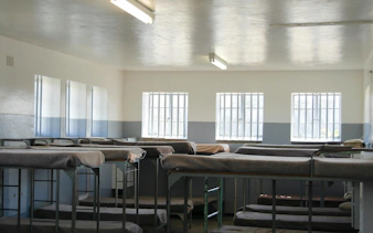 Dormitory with bunk beds in Robben Island prison, Cape Town.