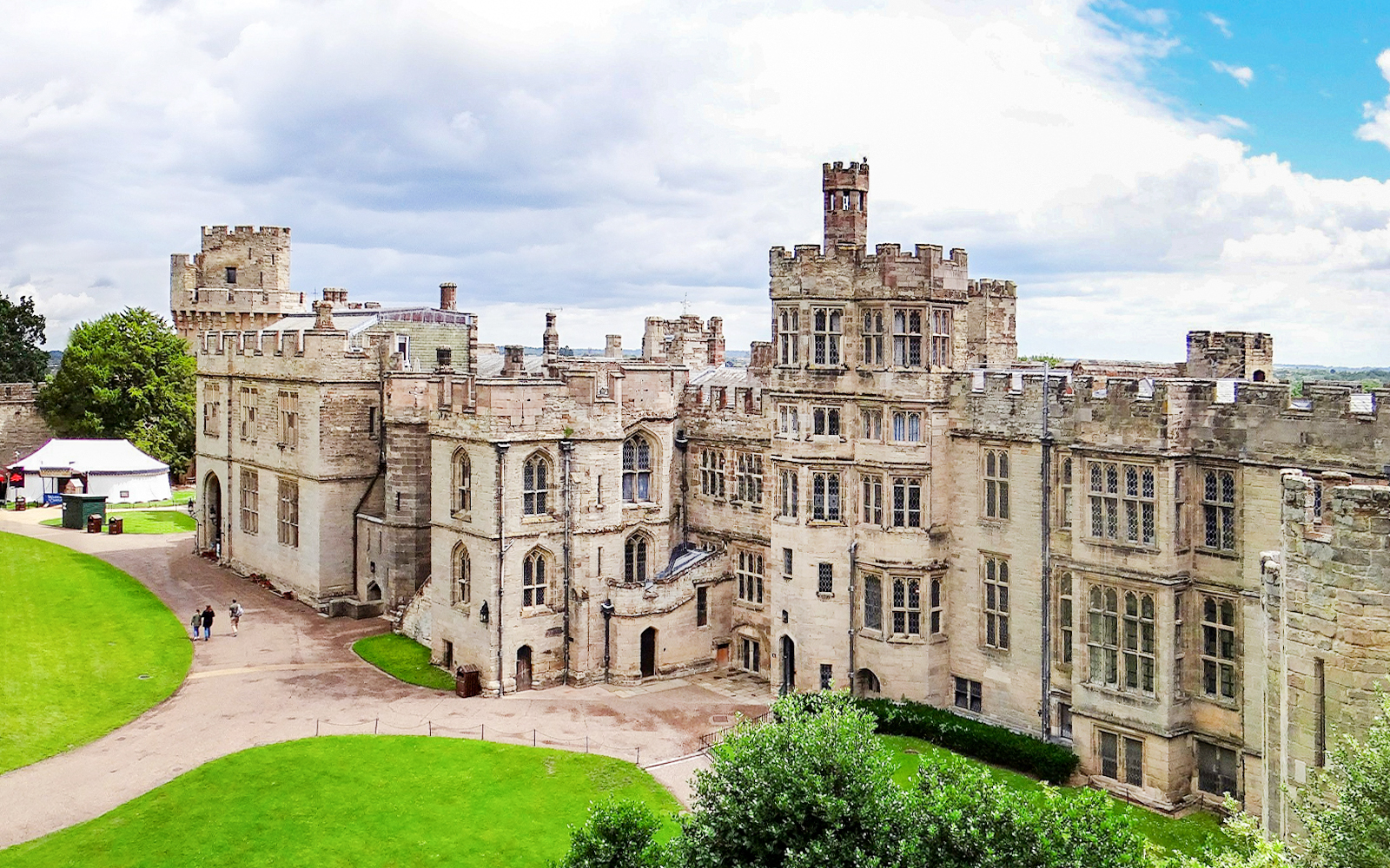 Warwick Castle medieval fortress with lush gardens in Warwick, England.