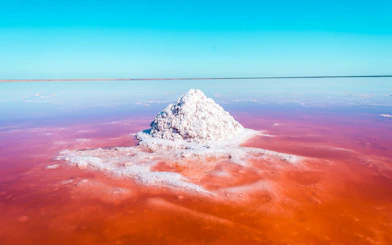Salt formation in bright pink lake near Baku, Shahdag Candy Cane Mountains tour.